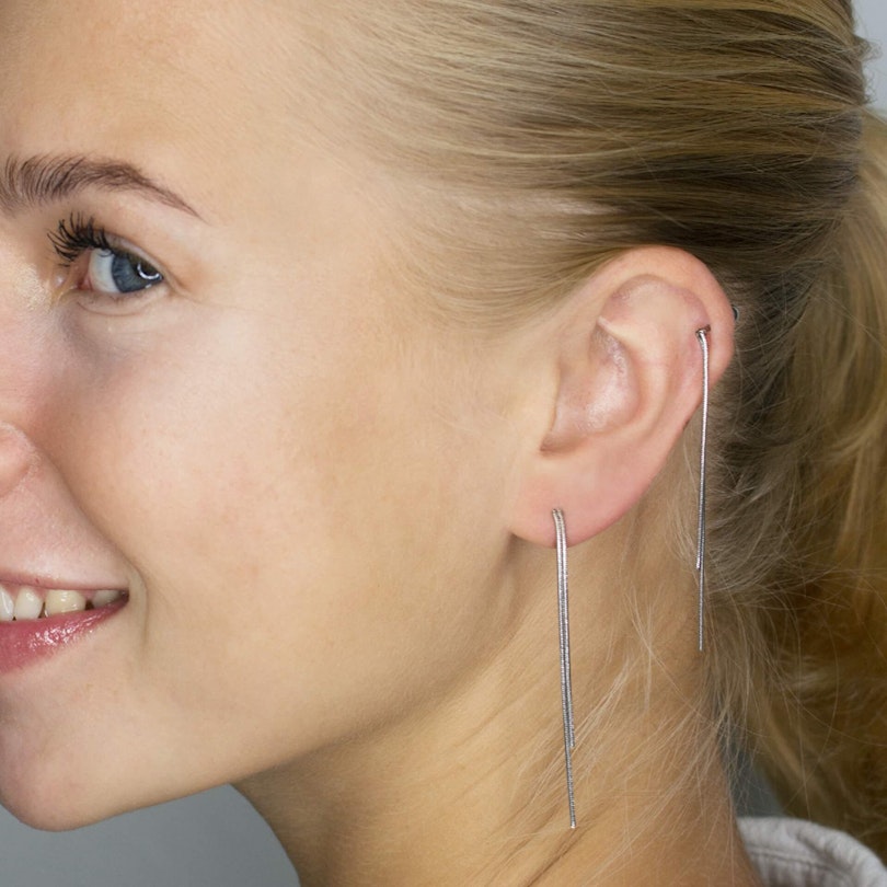 Piercing pour l'oreille avec doubles chaînes