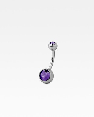 Piercing pour le nombril en titane avec deux pierres.