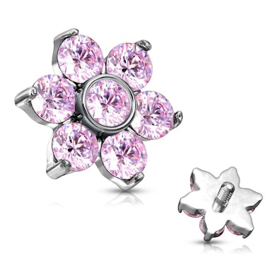 Ancre dermal avec pierres en forme de fleur étoilée.