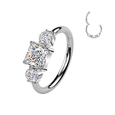 Anneau segment en titane avec trois pierres en zircone cubique