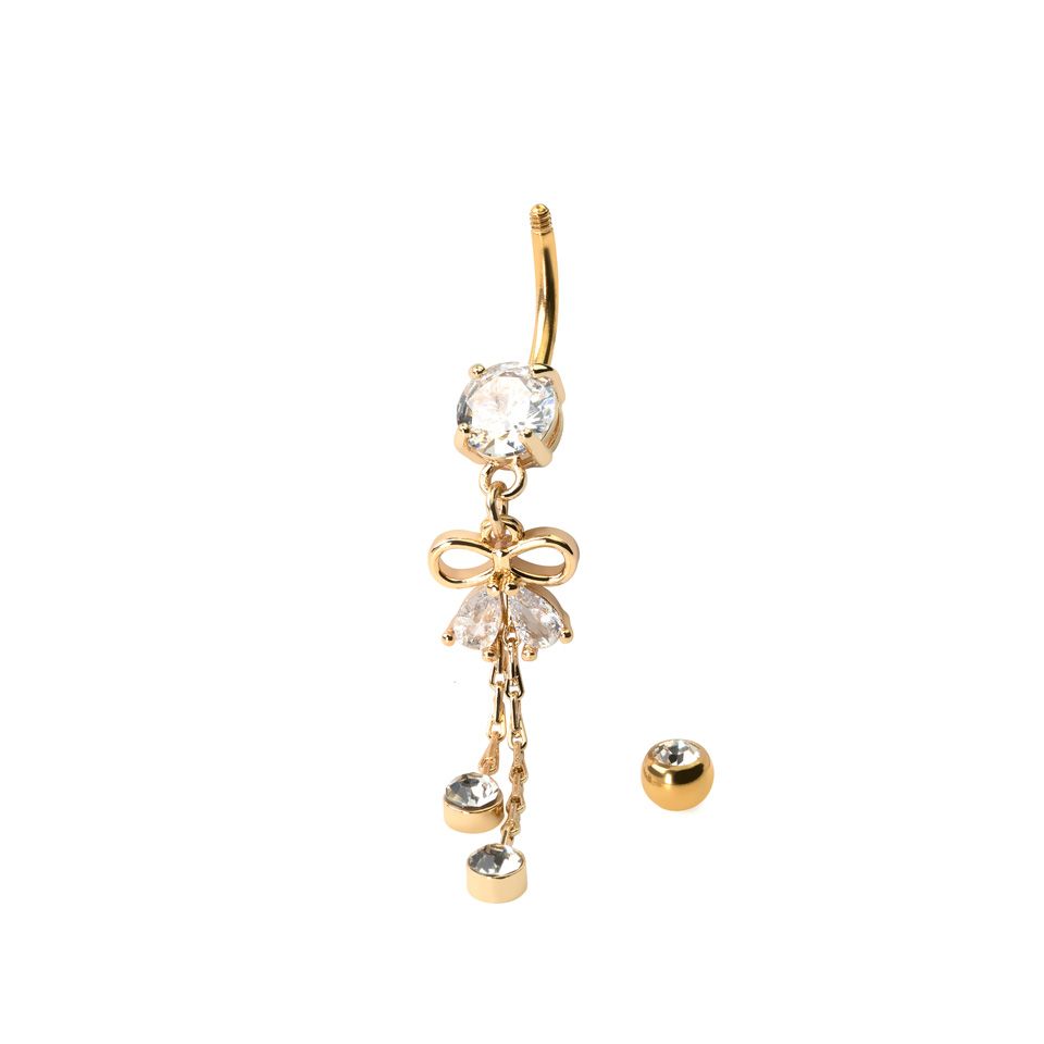 Piercing pour le nombril avec un joli pendentif