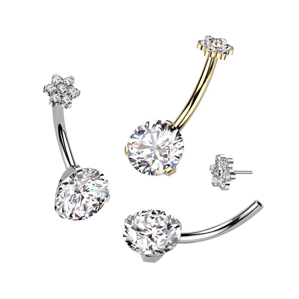 Piercing pour le nombril avec une grosse pierre et une fleur