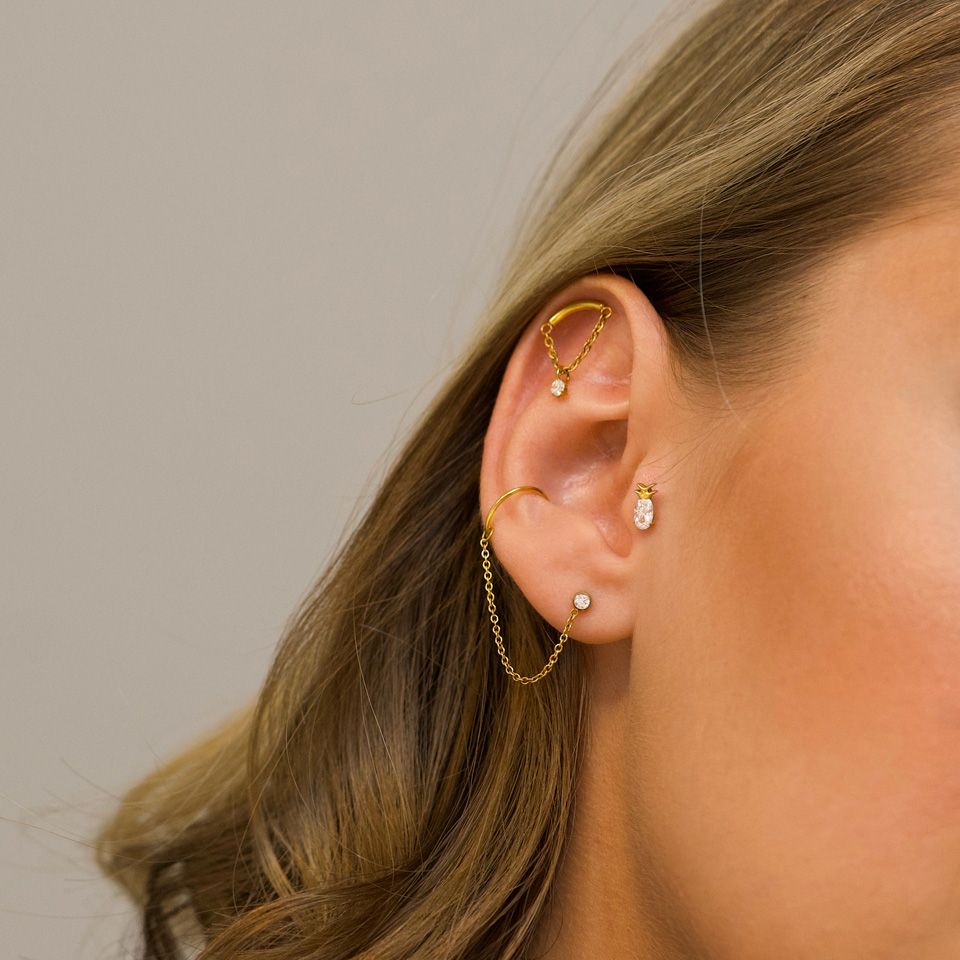 Labret incurvé avec une chaîne et une pierre pendante