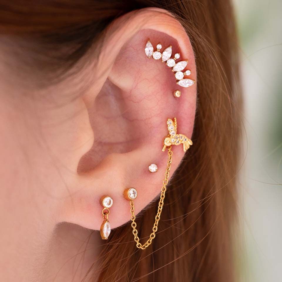 Labret avec un colibri orné de pierres