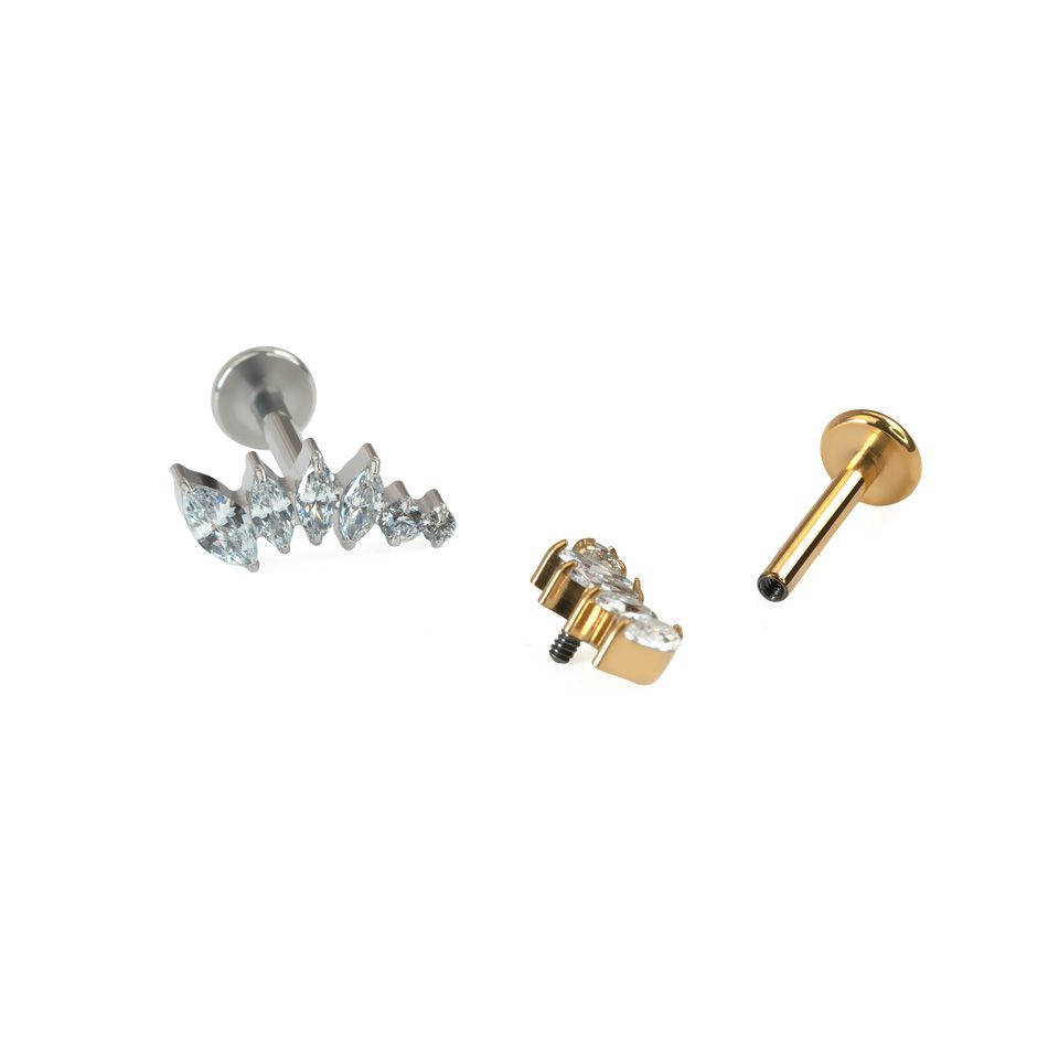 Labret incurvé en titane avec pierres de différentes tailles
