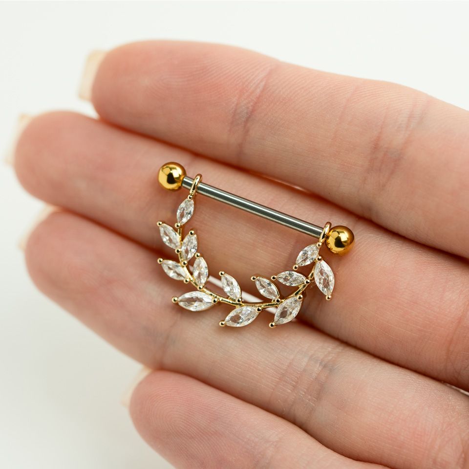 Piercing pour le téton avec feuilles en pierres