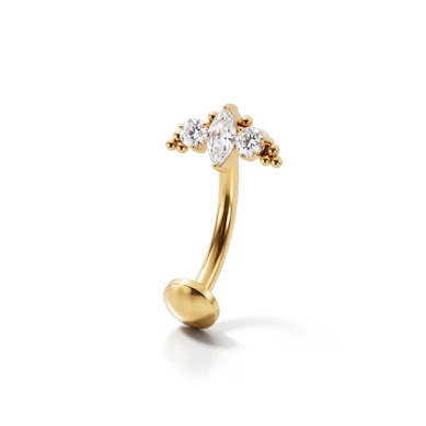 Piercing au nombril flottant en titane et design vintage