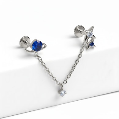 Duo de labrets en titane sur le thème de l'espace