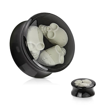 Plug en acrylique avec trois crânes