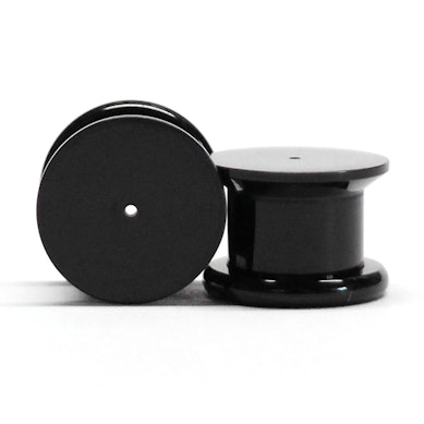 Plug en acrylique pour piercing à l'oreille.