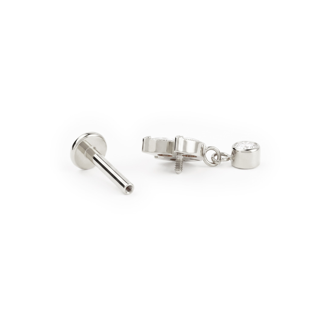 Labret en titane avec fleur de lotus et pierre pendante