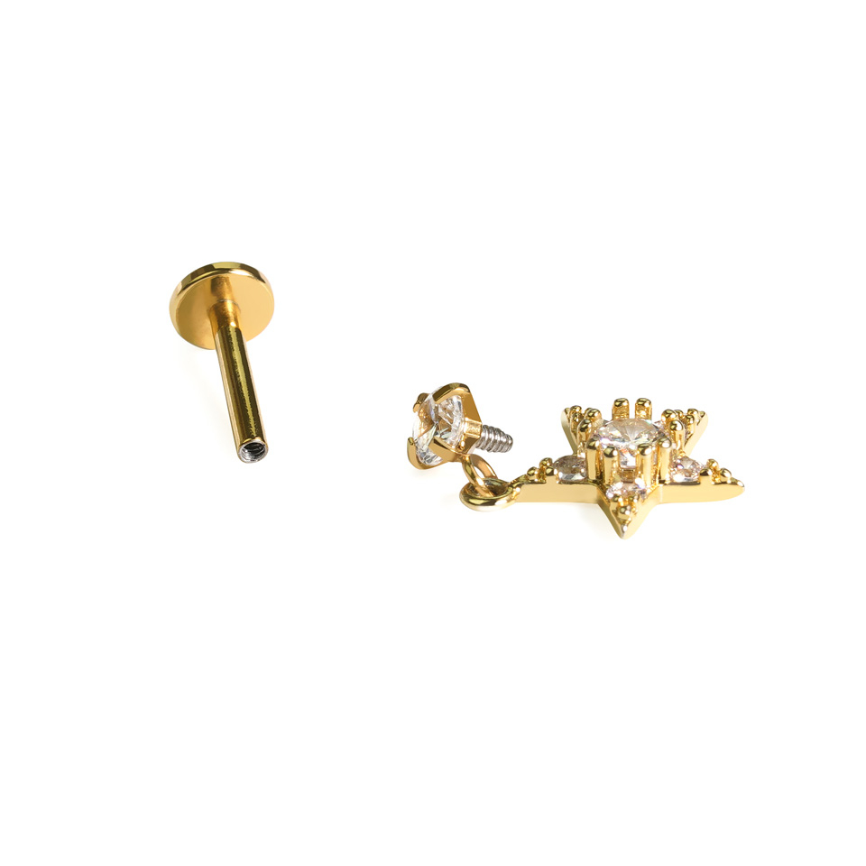 Labret avec une étoile pendante ornée de pierres