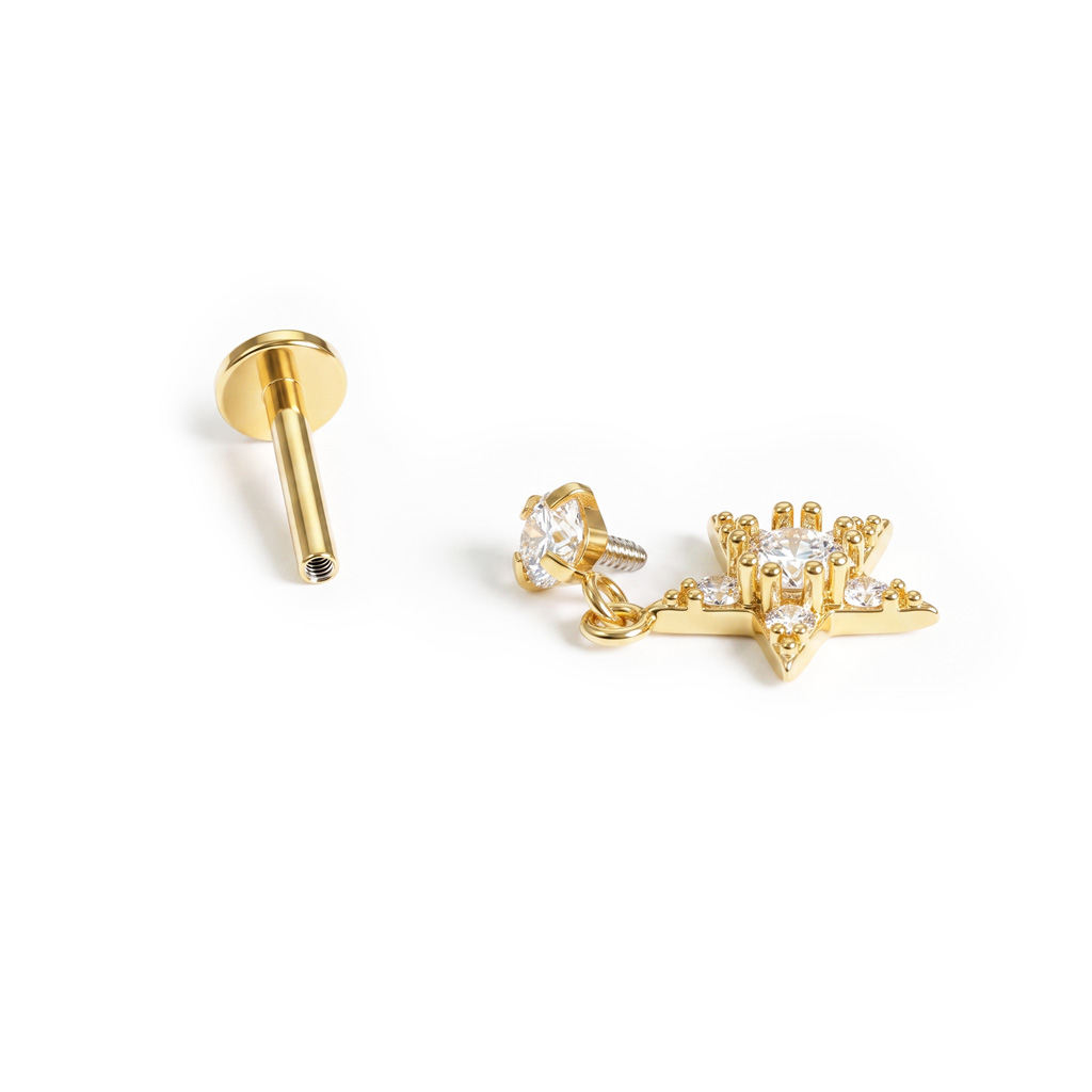 Labret avec une étoile pendante ornée de pierres