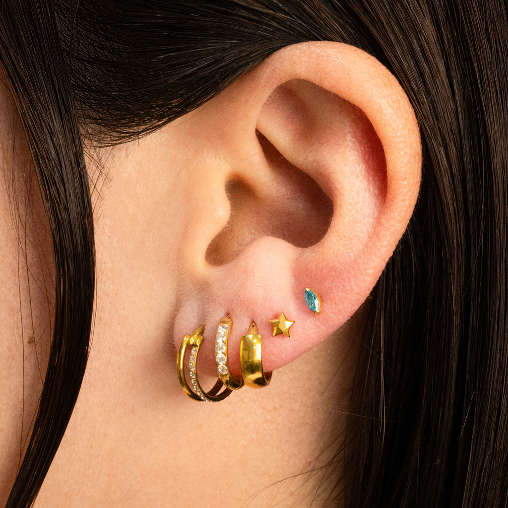 Labret en titane avec une étoile à plusieurs facettes