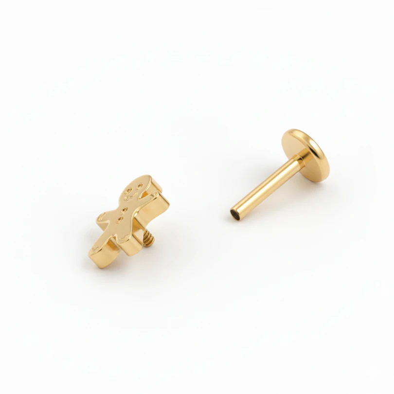 Labret en titane et bonhomme de pain d'épices