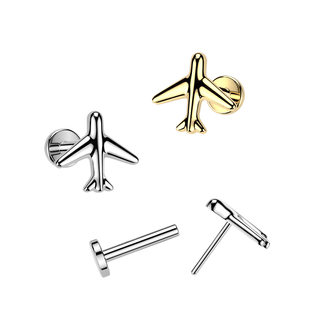 Labret en titane avec un avion