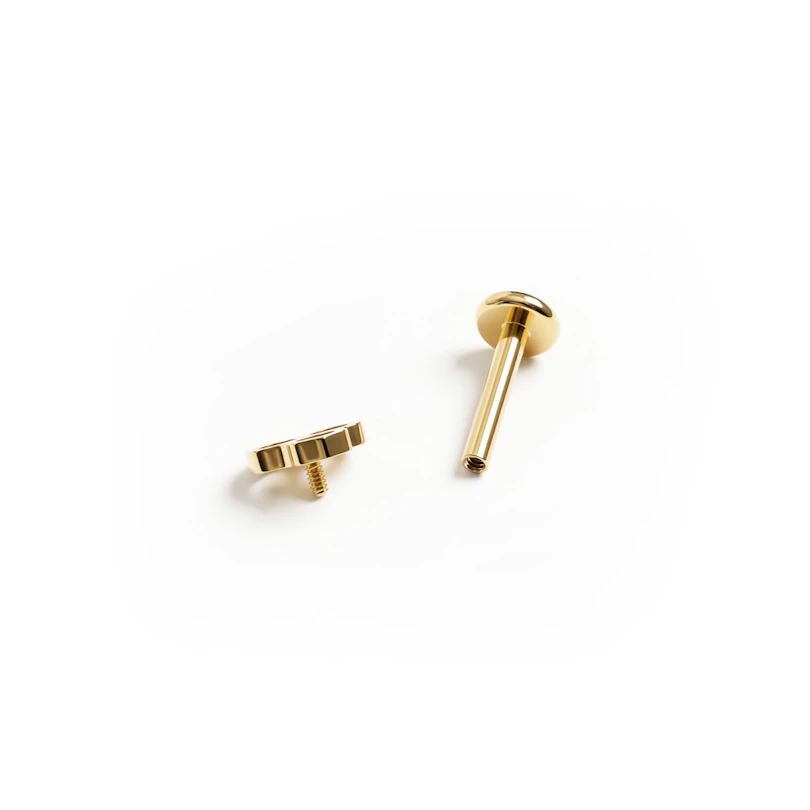 Labret en titane avec un design en nid d'abeilles