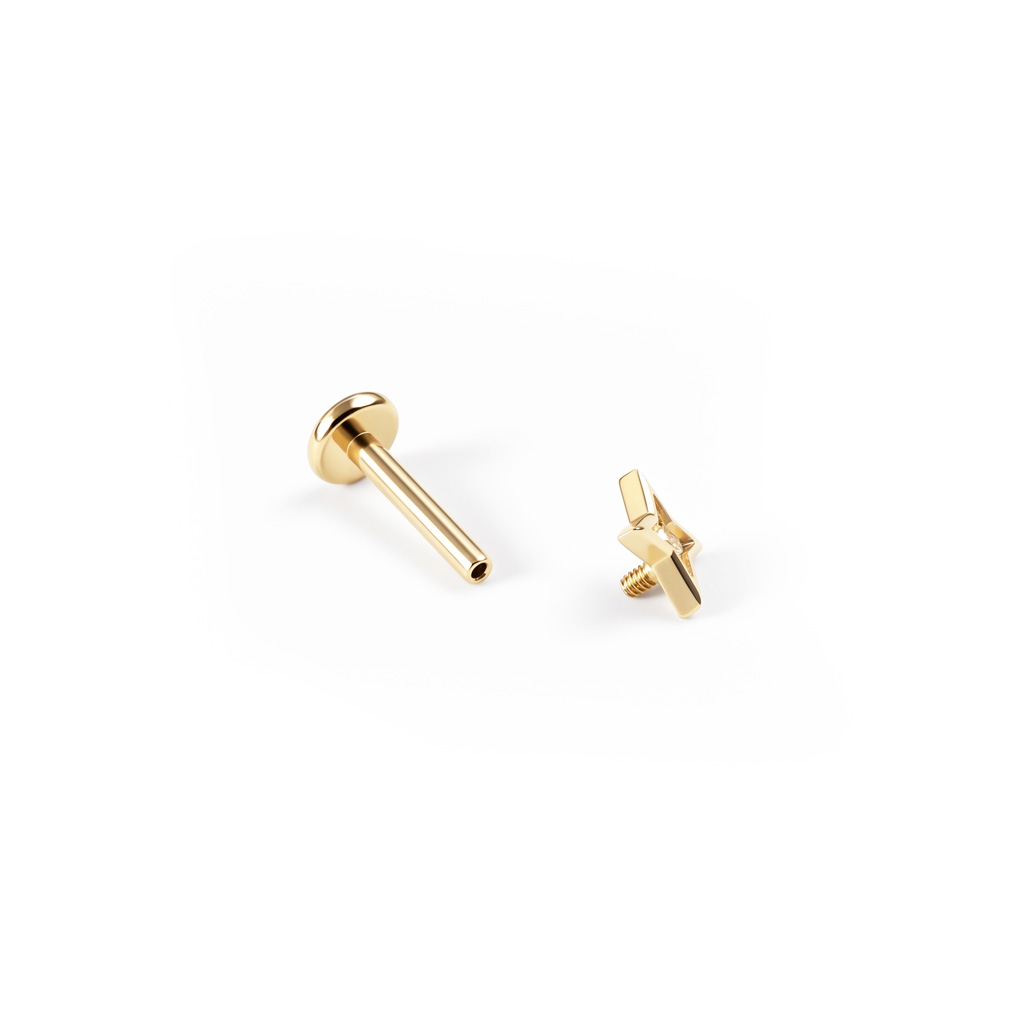 Labret en titane avec une étoile géométrique