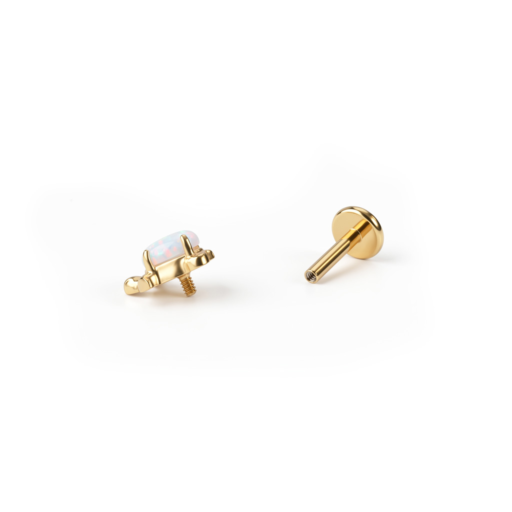 Labret en titane avec un motif tortue et une opale