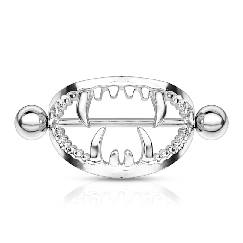 Piercing pour le têton avec une bouche et des crocs