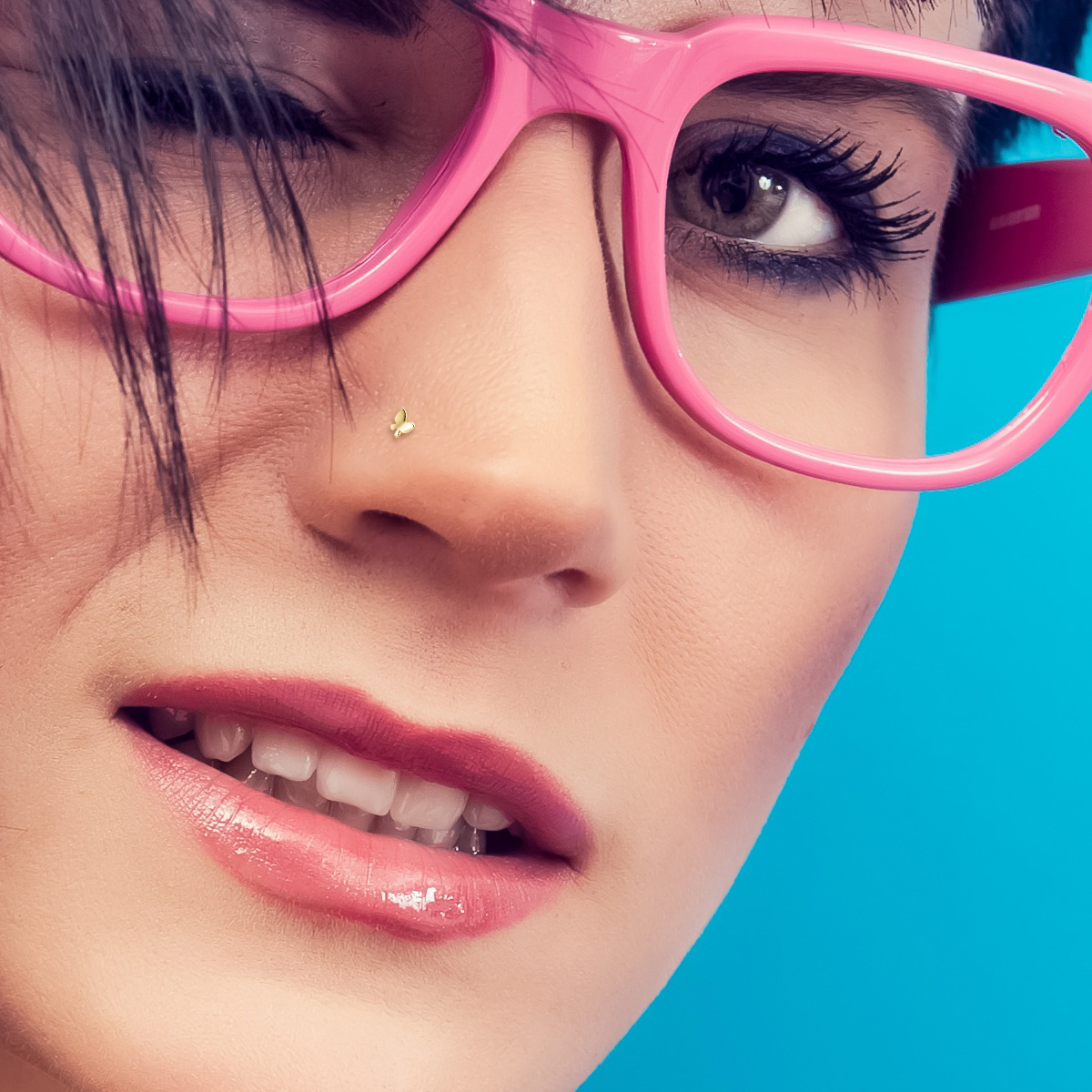 Tige en or 14 carats avec un papillon