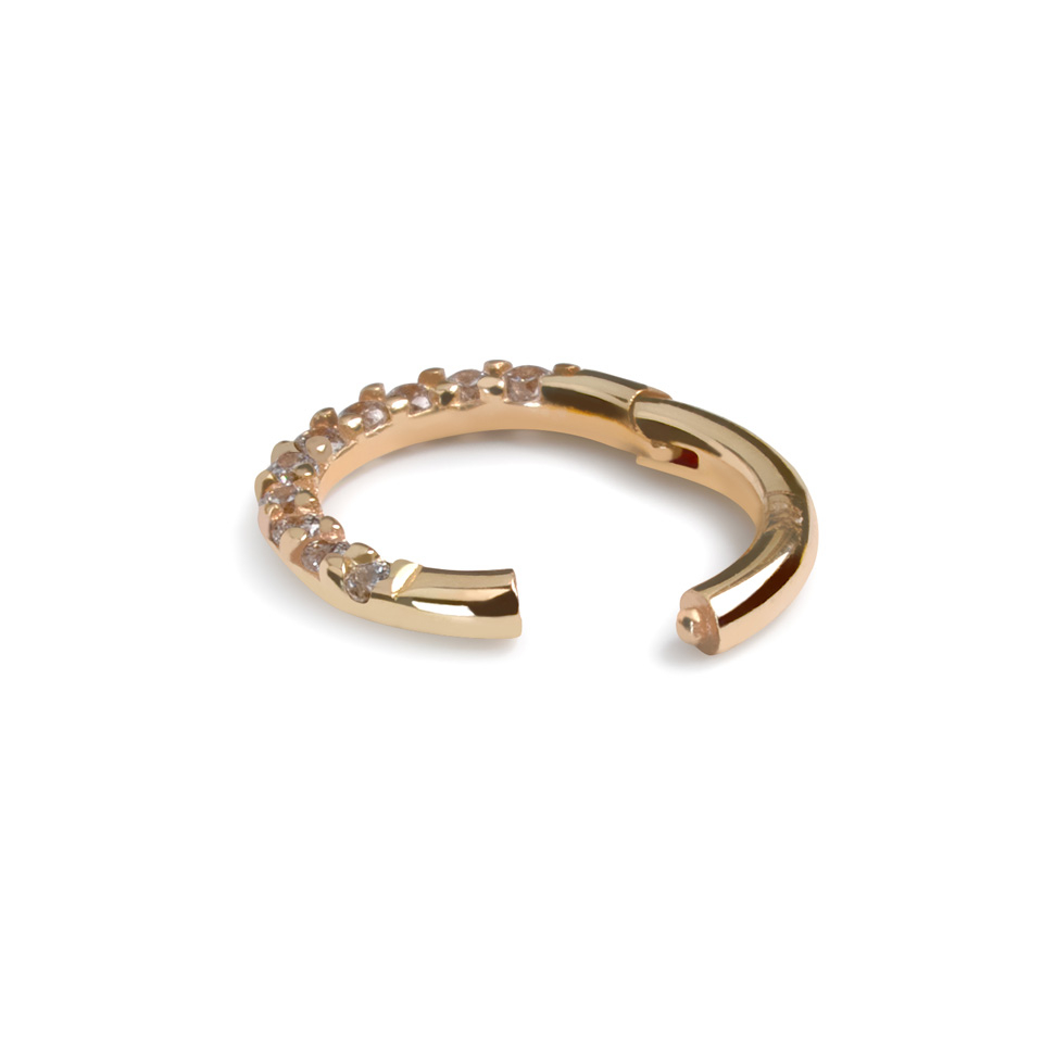 Anneau à charnière en or 14 carats avec une rangée de pierres en zircone