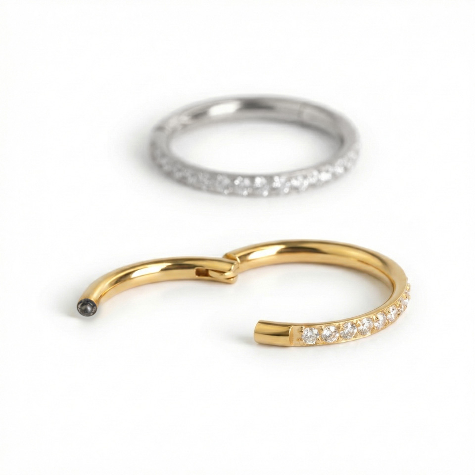 Anneau à charnière en acier chirurgical avec des pierres