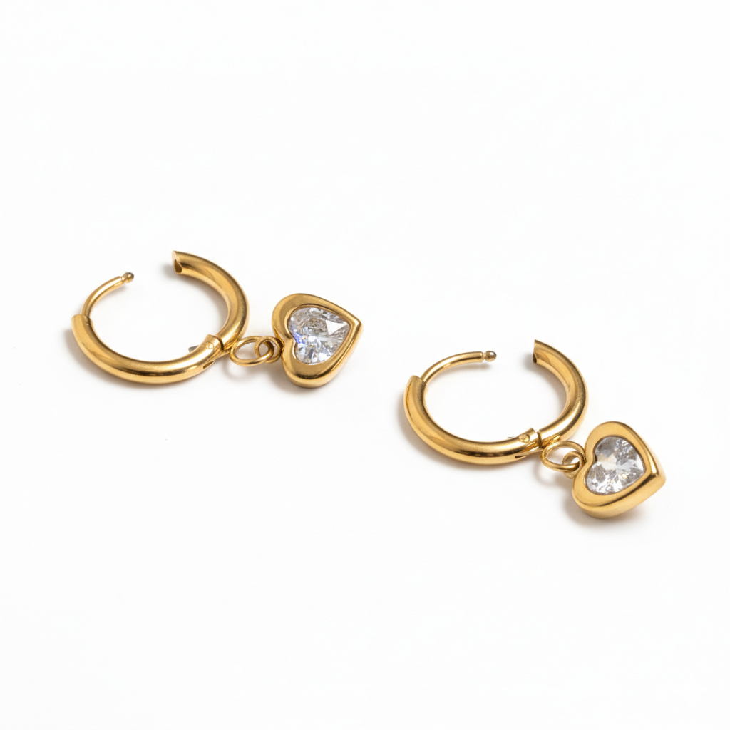 Paire de créoles avec un pendentif en forme de cœur