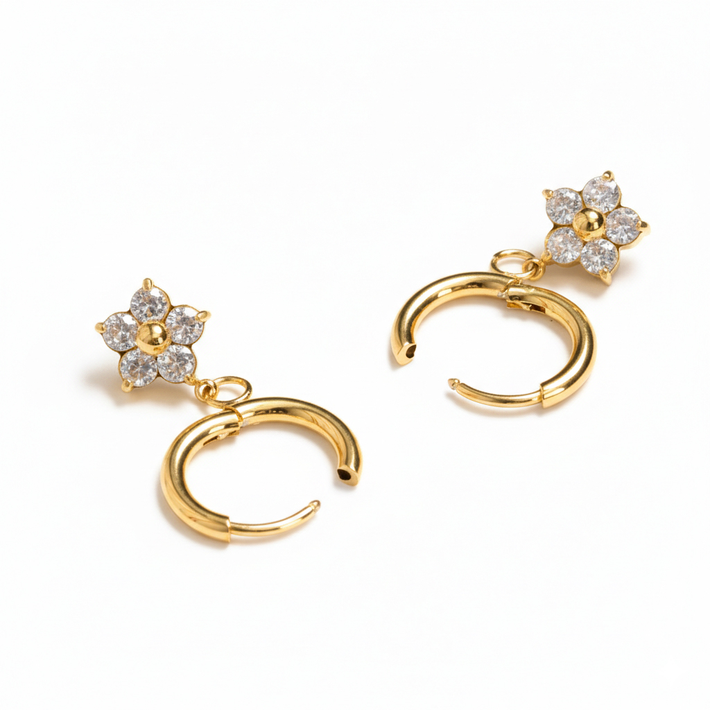 Paire de créoles avec un pendentif en forme de fleur