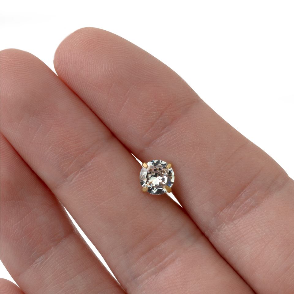Piercing pour la langue avec une pierre ronde